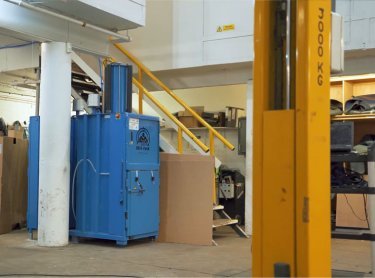 blue mil-tek baler in the workshop at jaguar land rover
