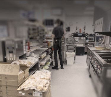 Man in a kitchen, symbolizing one of several segments