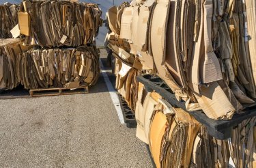 Image of stacked bales, featured in a guide about how much it costs to buy a new baler