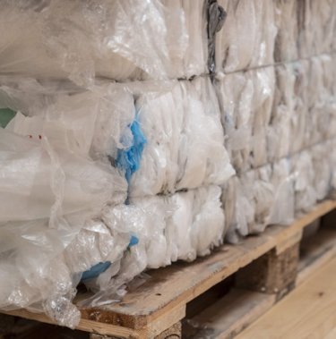part of a plastic bale on a pallet