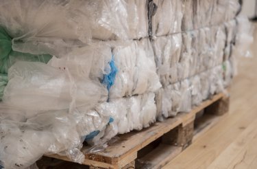 part of a plastic bale on a pallet