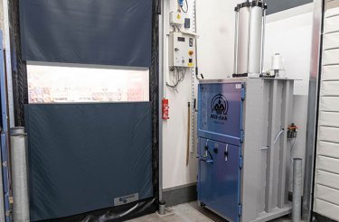 waste baler back of house in restaurant