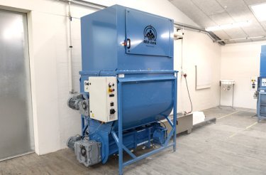 compactor minimizing polystyrene waste in warehouse facility