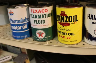 oil-cans-in automotive-repair-shop
