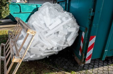 construction-waste-polystyrene-at-container