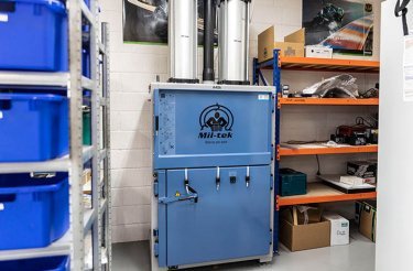 small business with cardboard baler