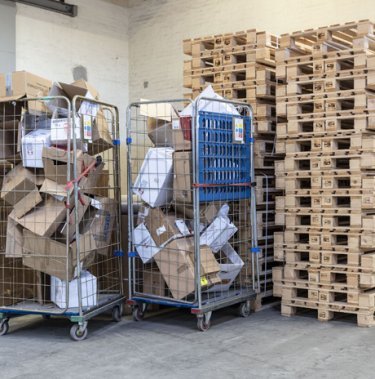 cardboard in cages for disposal