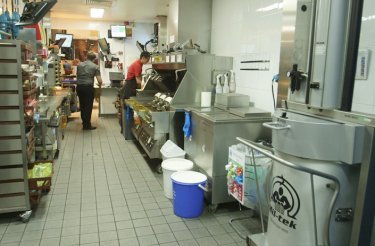 rubbish compactor in kitchen