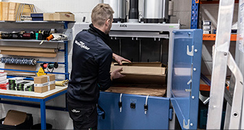 Save money with a cardboard baler