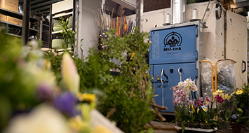 Save space with a cardboard baler