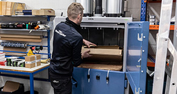 Save money with a cardboard baler